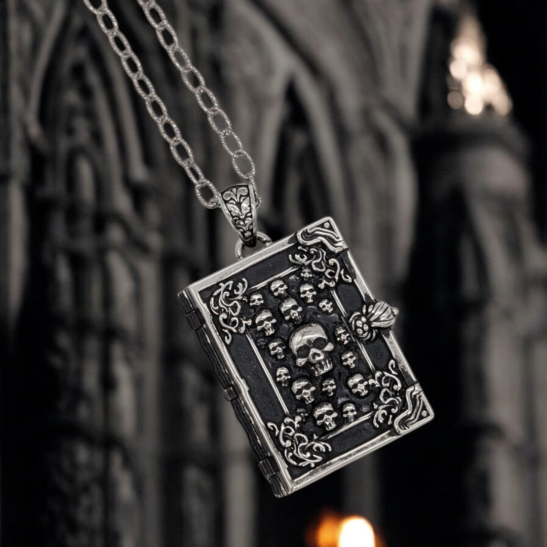 Arcane Book Locket Pendant crafted from blackened sterling silver with skull and filigree details