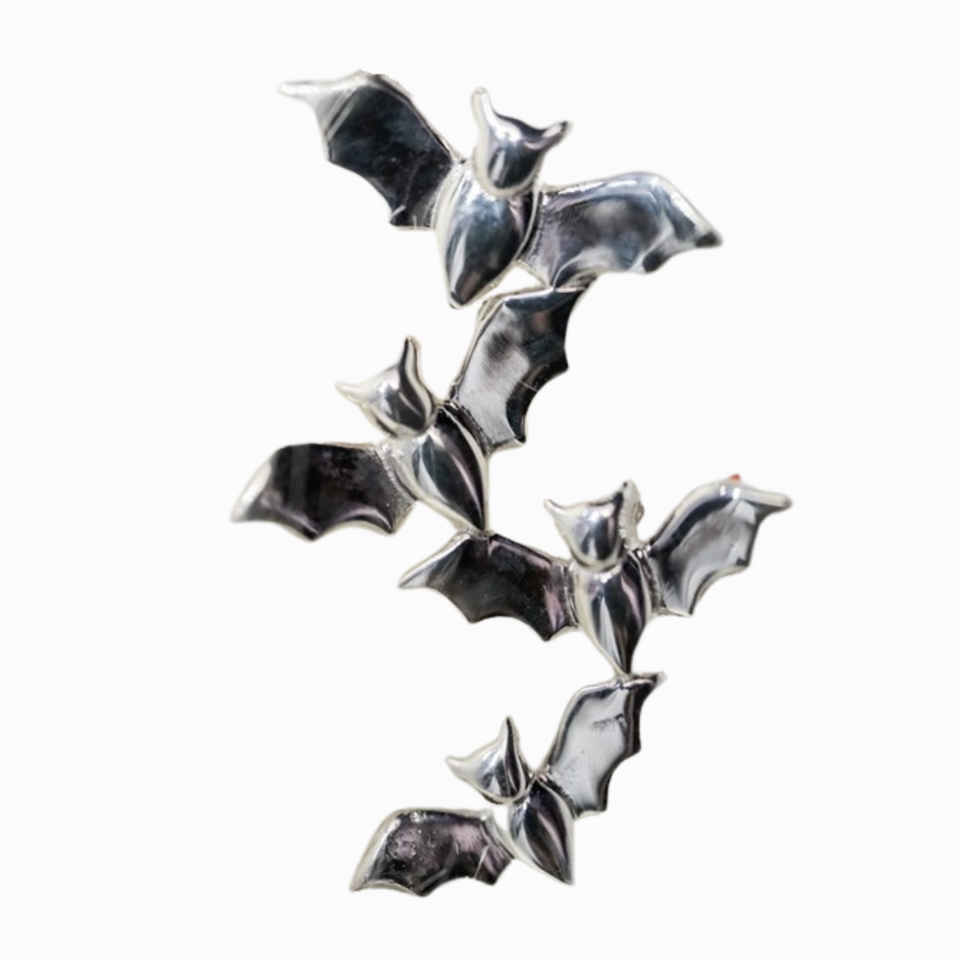Sterling silver necklace featuring a cascading formation of five bats, Bewitching Bats Necklace