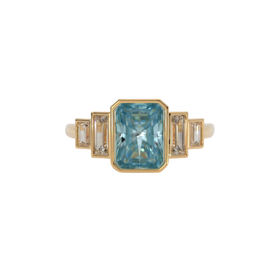 Lustre Ring in 14k yellow gold featuring a radiant cut gemstone and baguette accents, bezel set in a sleek and polished design