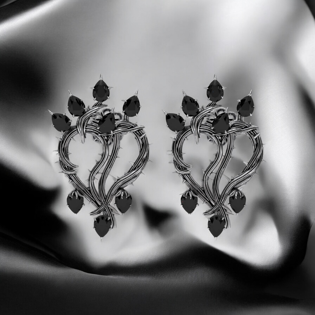 Thorned Heart Earrings crafted from blackened silver with black moissanite.