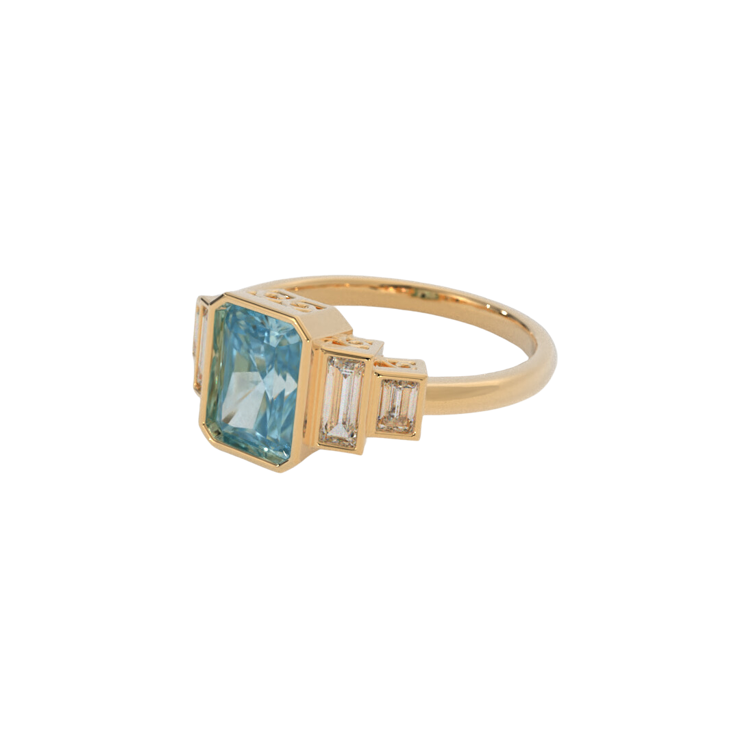 Lustre Ring in 14k yellow gold featuring a radiant cut gemstone and baguette accents, bezel set in a sleek and polished design