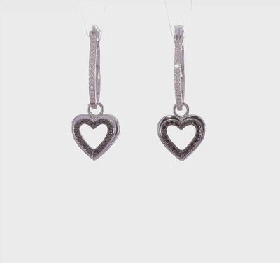 Amour Hoops in rhodium-plated sterling silver with white diamonds and black diamond heart charm.